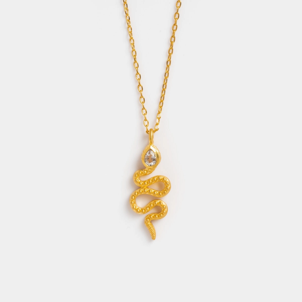 White Topaz Dot Snake Pendant Necklace